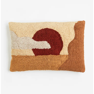 tufted rectangle pillow with a sunset pattern