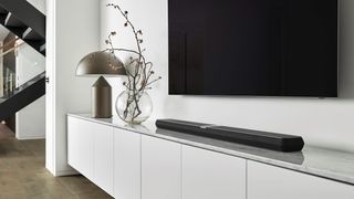 Bowers & Wilkins Panorama 3 on a white TV stand with screen above