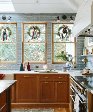 Blue and wooden kitchen decorated for the holidays