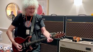 Brian May plays guitar for the first time since suffering a stroke. 