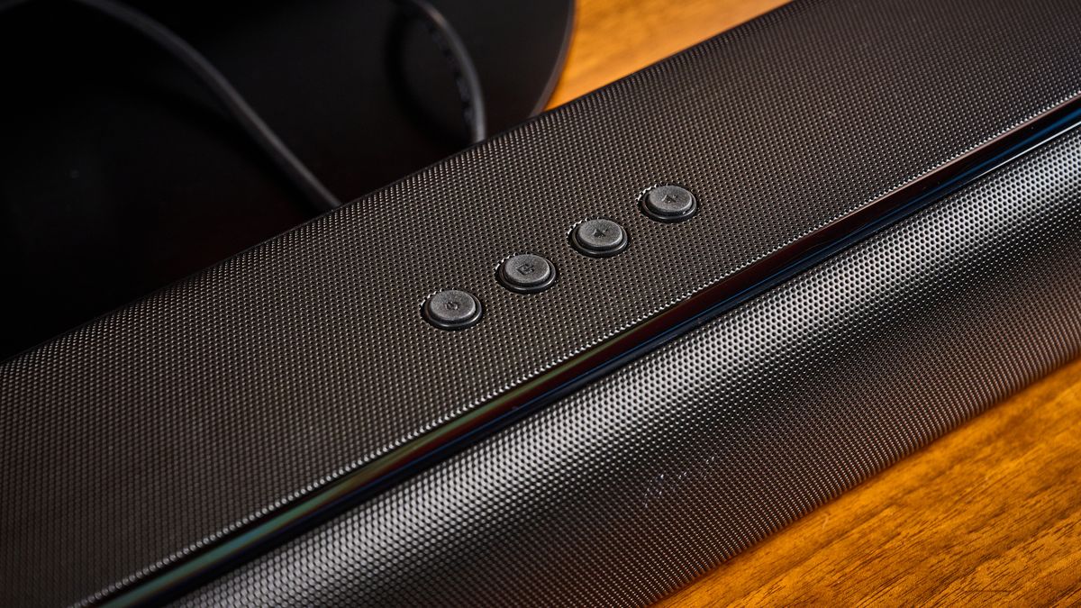 the budget majority naga 60 soundbar in black, showing its buttons and remote