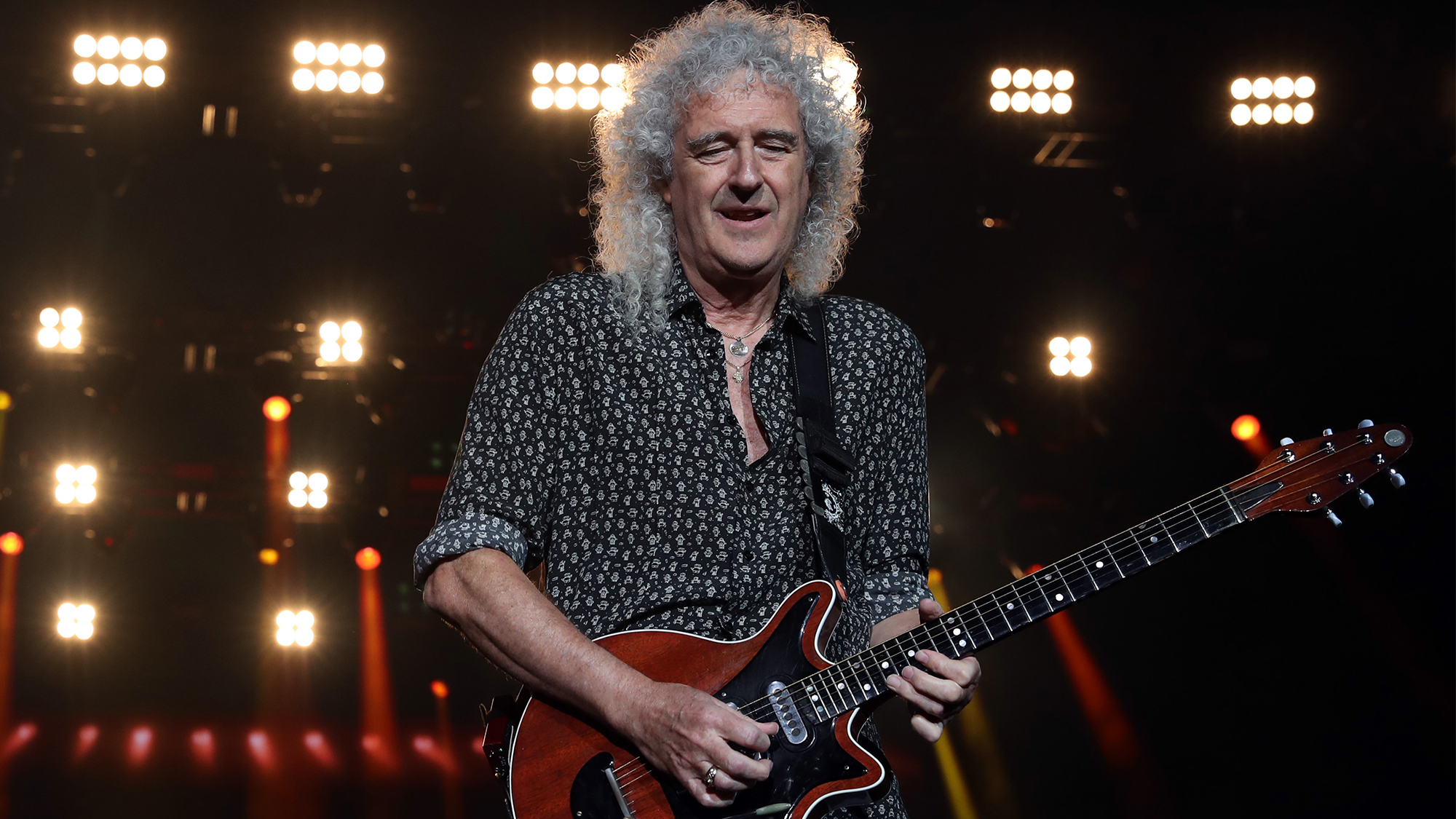 Brian May of Queen performs during Fire Fight Australia at ANZ Stadium on February 16, 2020 in Sydney, Australia.
