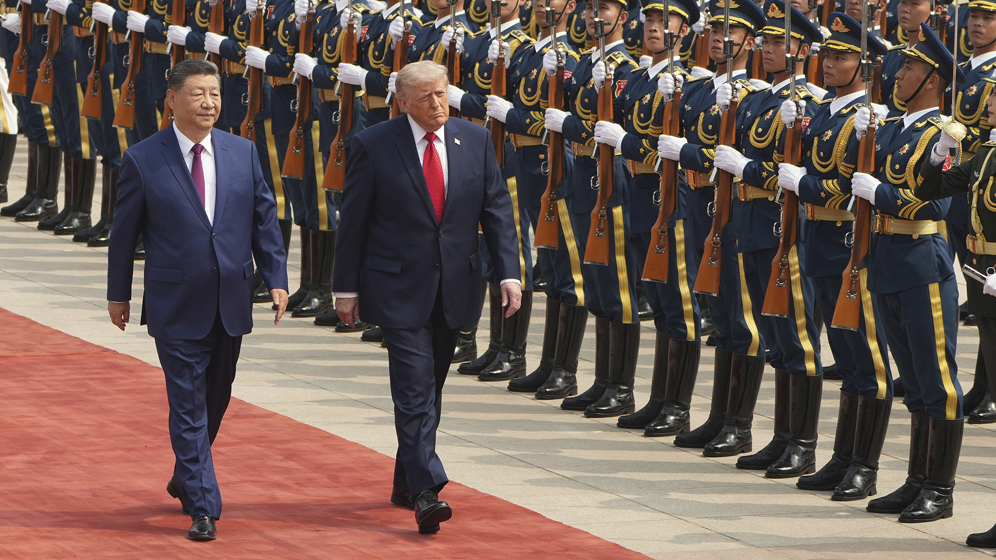 President Donald Trump participates in a welcome ceremony with China's President Xi Jinping at the Great Hall of the People in Beijing