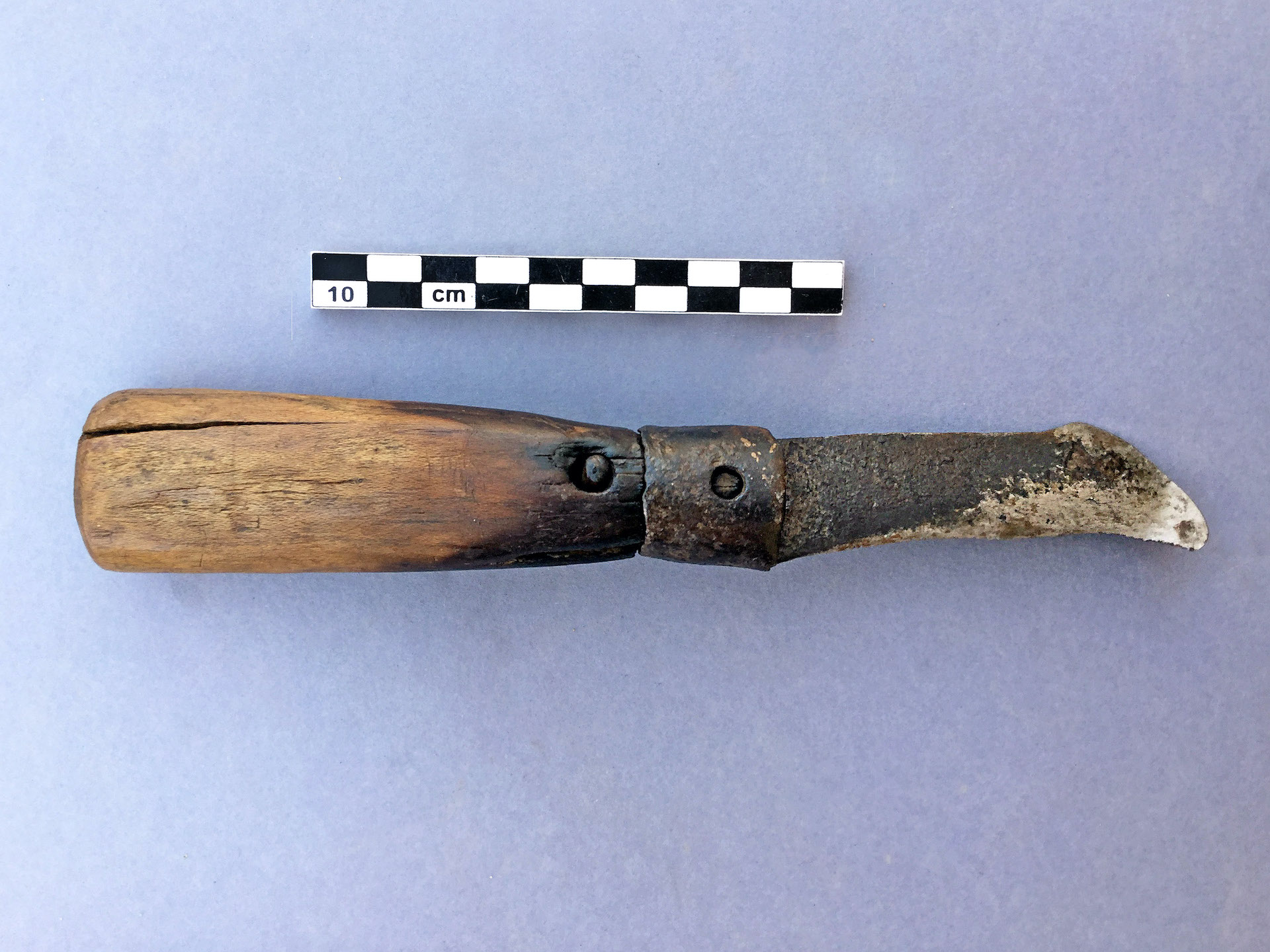 A knife with an iron blade and wooden handle was among the finds, and the researchers think it may have been used by ancient robbers to cut the bandages of the mummies.