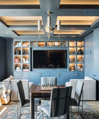 Dining room alternatives, blue room with TV, bespoke shelving an square dining table