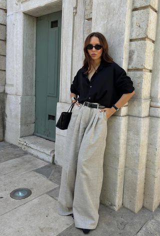 summer wardrobe essential shown on a woman wearing trousers