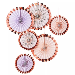 A set of lavender and blush paper fans with bronze borders