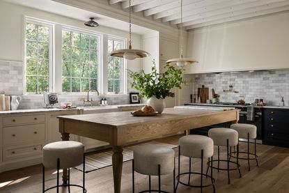 a modern kitchen with beige interiors