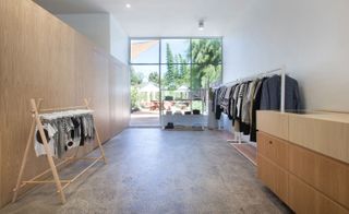 Skylights and windows with glass doors at clothing store