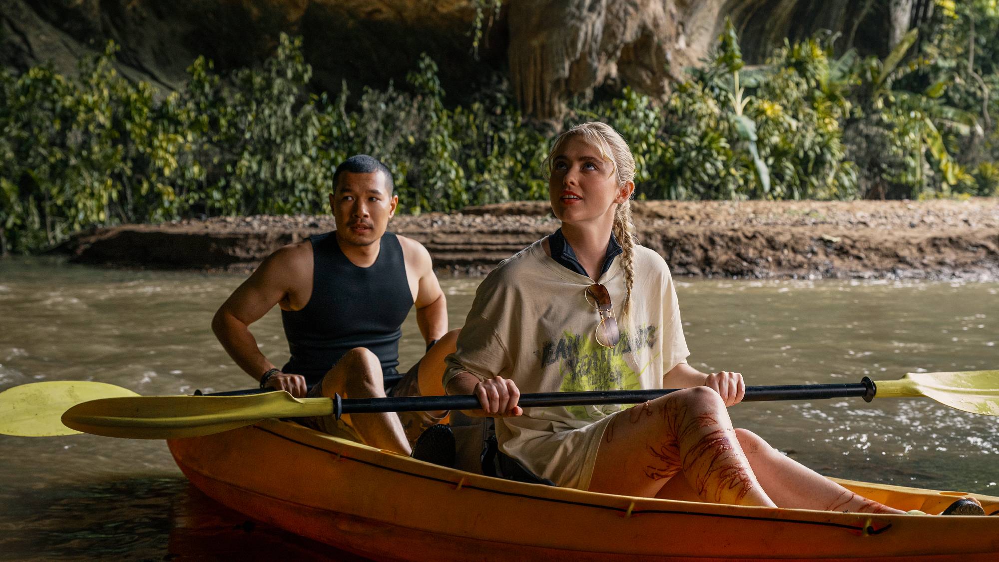 Tayme Thapthimthong as &amp;ldquo;Wat&amp;rdquo; and Kathryn Newton as &amp;quot;Sara&amp;quot; in &amp;quot;The Devil's Mouth&amp;quot; on Prime Video