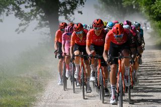 RAPOLANO TERME ITALY MAY 09 LR Tadej Pogacar of Slovenia and UAE Team Emirates Pink Leader Jersey Geraint Thomas of The United Kingdom and Magnus Sheffield of The United States and Team INEOS Grenadiers compete during the 107th Giro dItalia 2024 Stage 6 a 180km stage from Viareggio to Rapolano terme 322m UCIWT on May 09 2024 in Rapolano terme Italy Photo by Tim de WaeleGetty Images