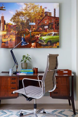 modern home office with office chair and large print
