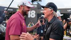 Marc Leishman and Greg Norman at a LIV Golf event