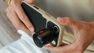 The Moment SuperTele 240mm lens on an iPhone