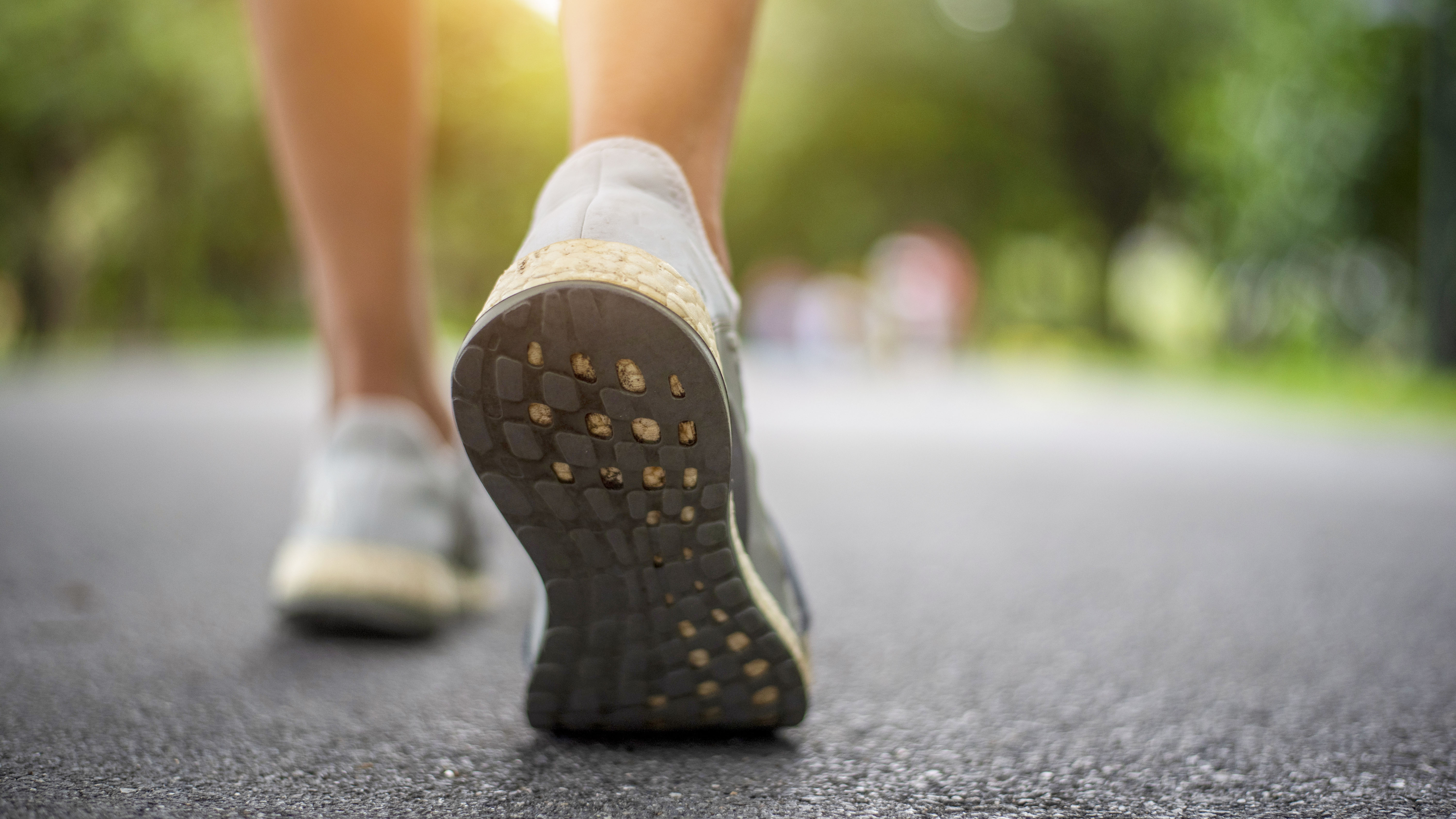 close-up of a walking person's shoes