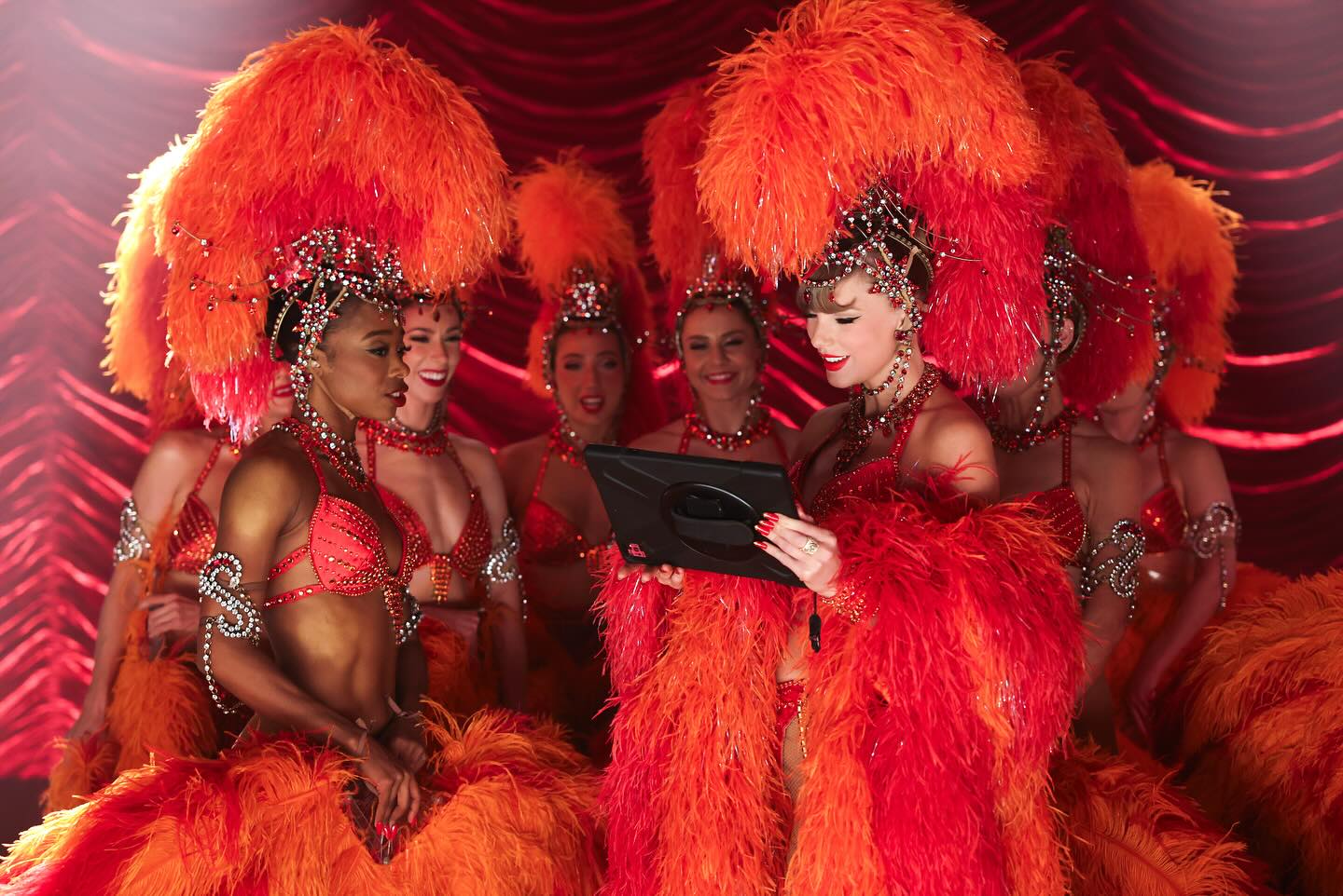Taylor Swift and her backup dancers wearing Bob Mackie on the set of the Fate of Ophelia music video