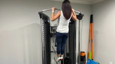 Wendy Batts performing a pull-up