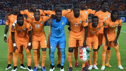 Goalkeeper Boubacar Barry among his Ivory Coast teammates 