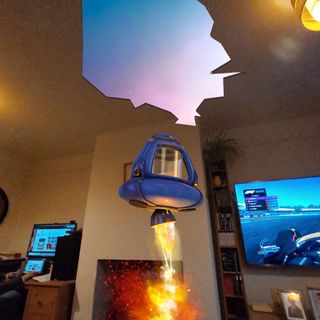 Meta Quest 3 VR screen grab showing firey flying object in room