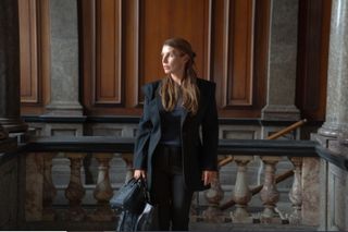 Coleen Rooney pictures walking through a courthouse