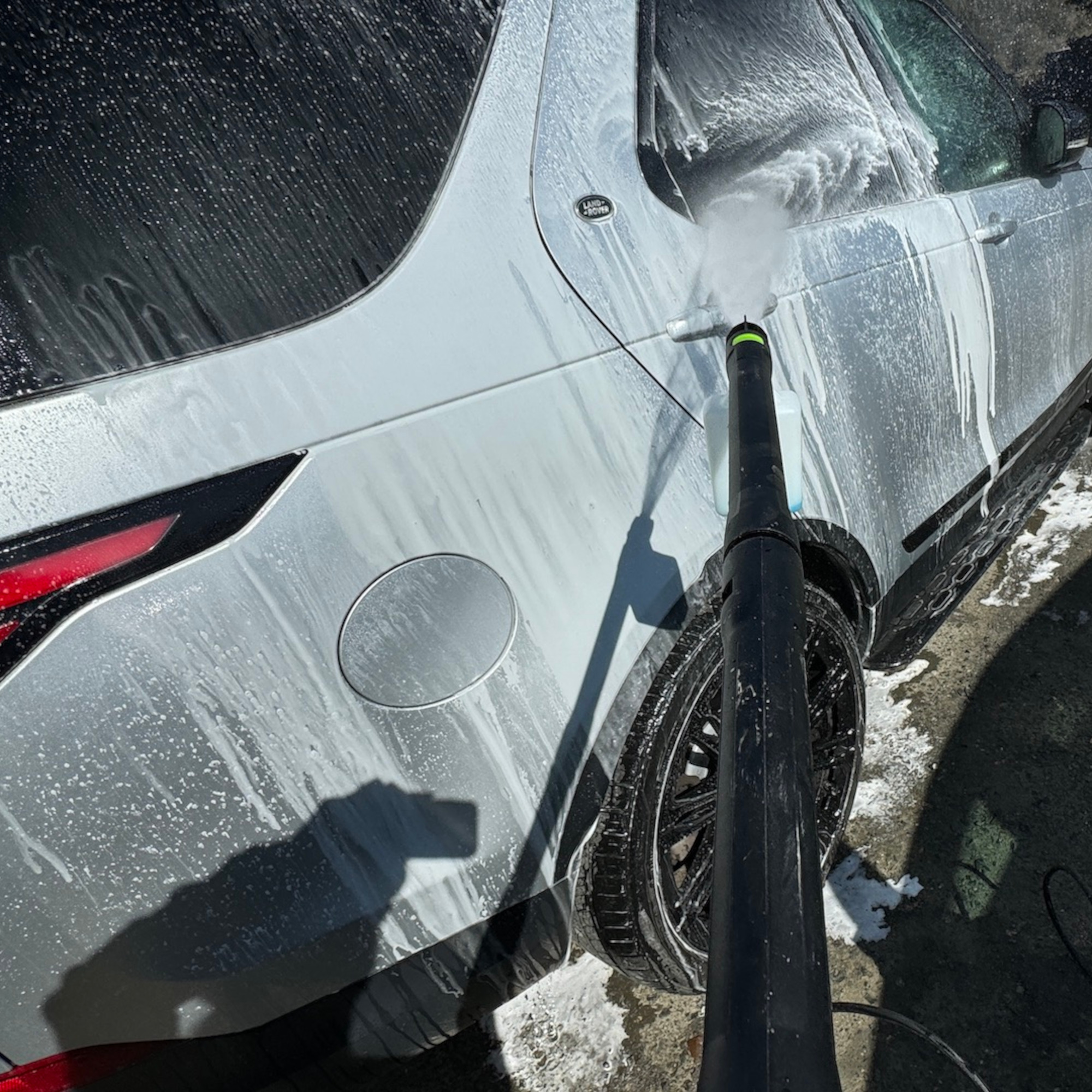 using the greenworks g40 pressure washer with foam on a white land rover