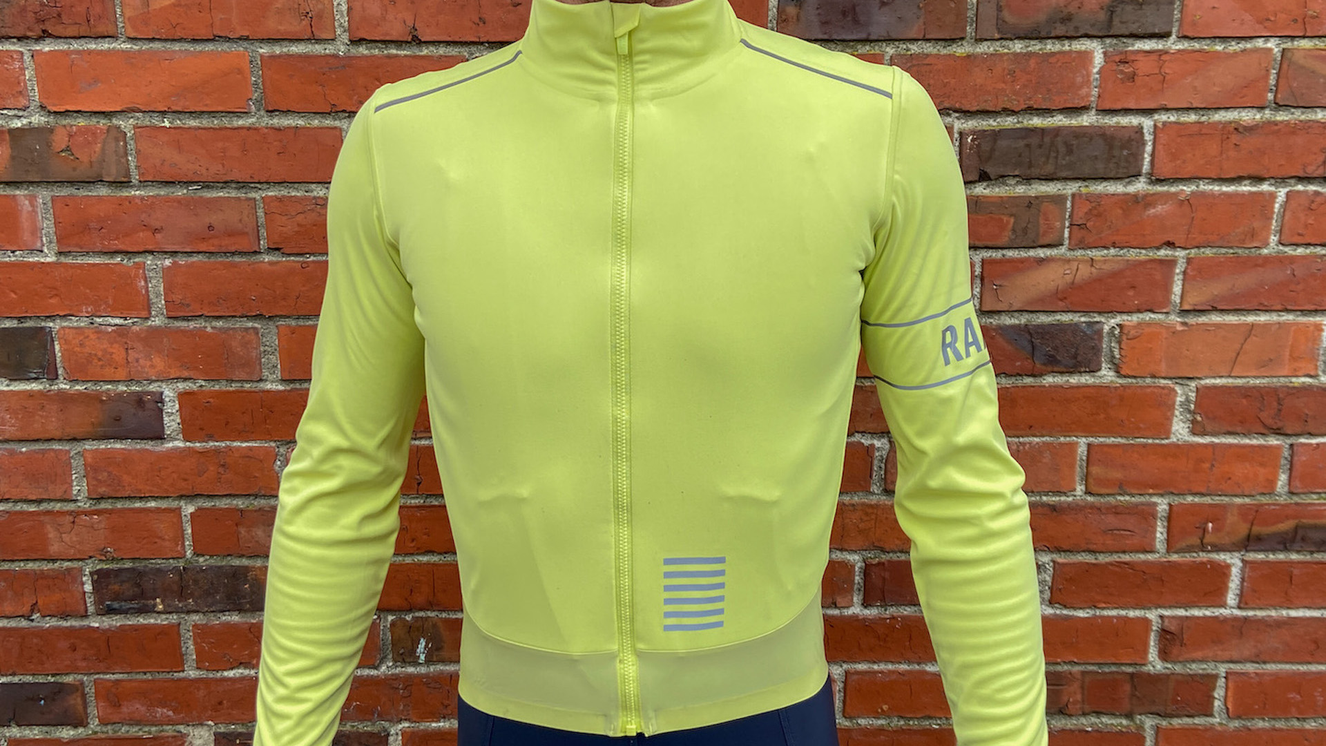 Male cyclist wearing Rapha Men's Pro Team Long Sleeve GORE-TEX INFINIUM Jersey