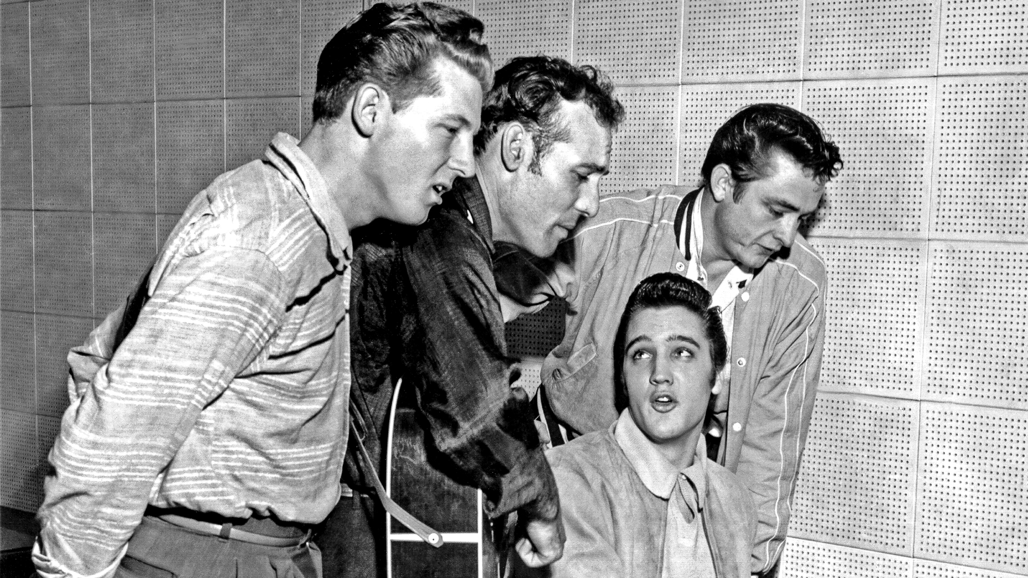 Rock and roll musicians Jerry Lee Lewis, Carl Perkins, Elvis Presley and Johnny Cash as "The Million Dollar Quartet" December 4, 1956 in Memphis, Tennessee. This was a one night jam session at Sun Studios.