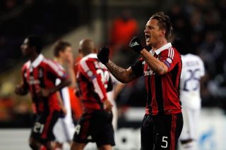 Philippe Mexes celebrates after scoring an overhead kick for AC Milan against Anderlecht in the Champions League in November 2012.