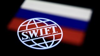 The SWIFT logo over the Russian flag