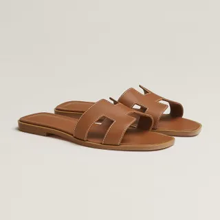 hermes oran sandals in gold 