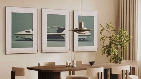 A digital art frame on a wall