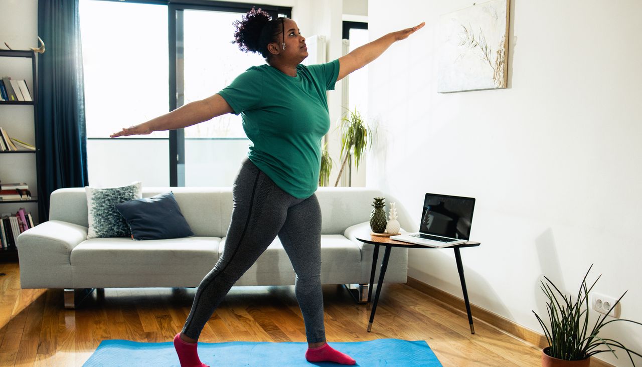 Woman exercising at home