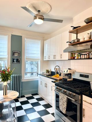Bright light kitchen with checkered floor tiles