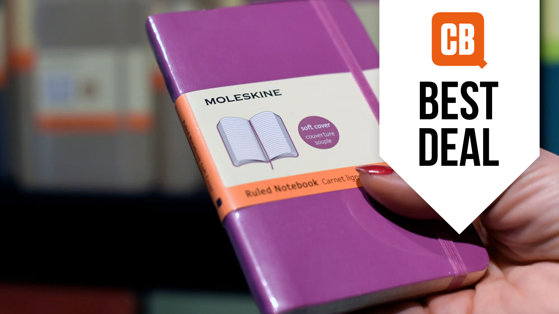 Moleskine notebook in someone's hand with text that says best deal