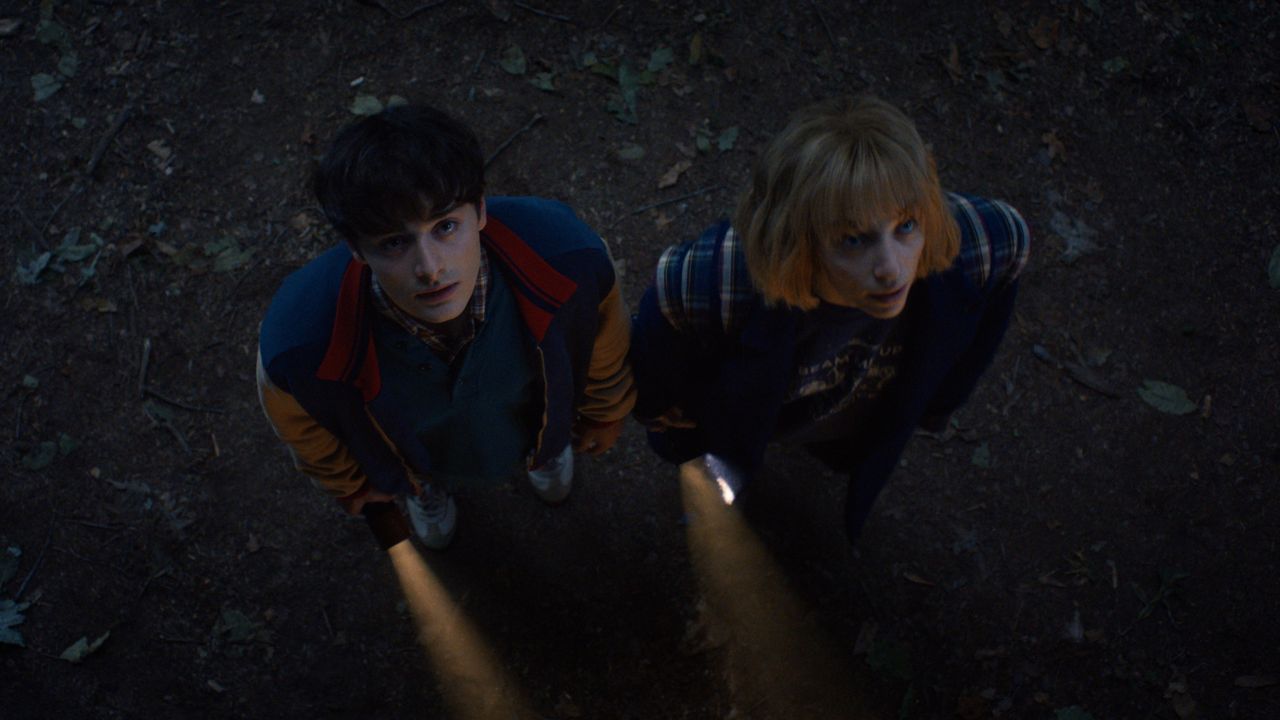 L-R: Will Byers (Noah Schnapp) and Robin Buckley (Maya Hawke) explore the Upside Down in a scene from "Stranger Things" season 5