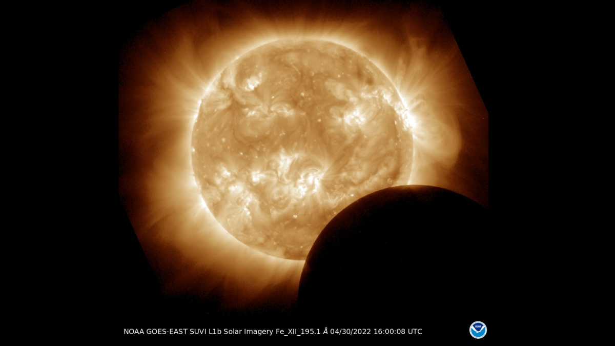 During the partial solar eclipse the moon covers a portion of the surface of the sun.