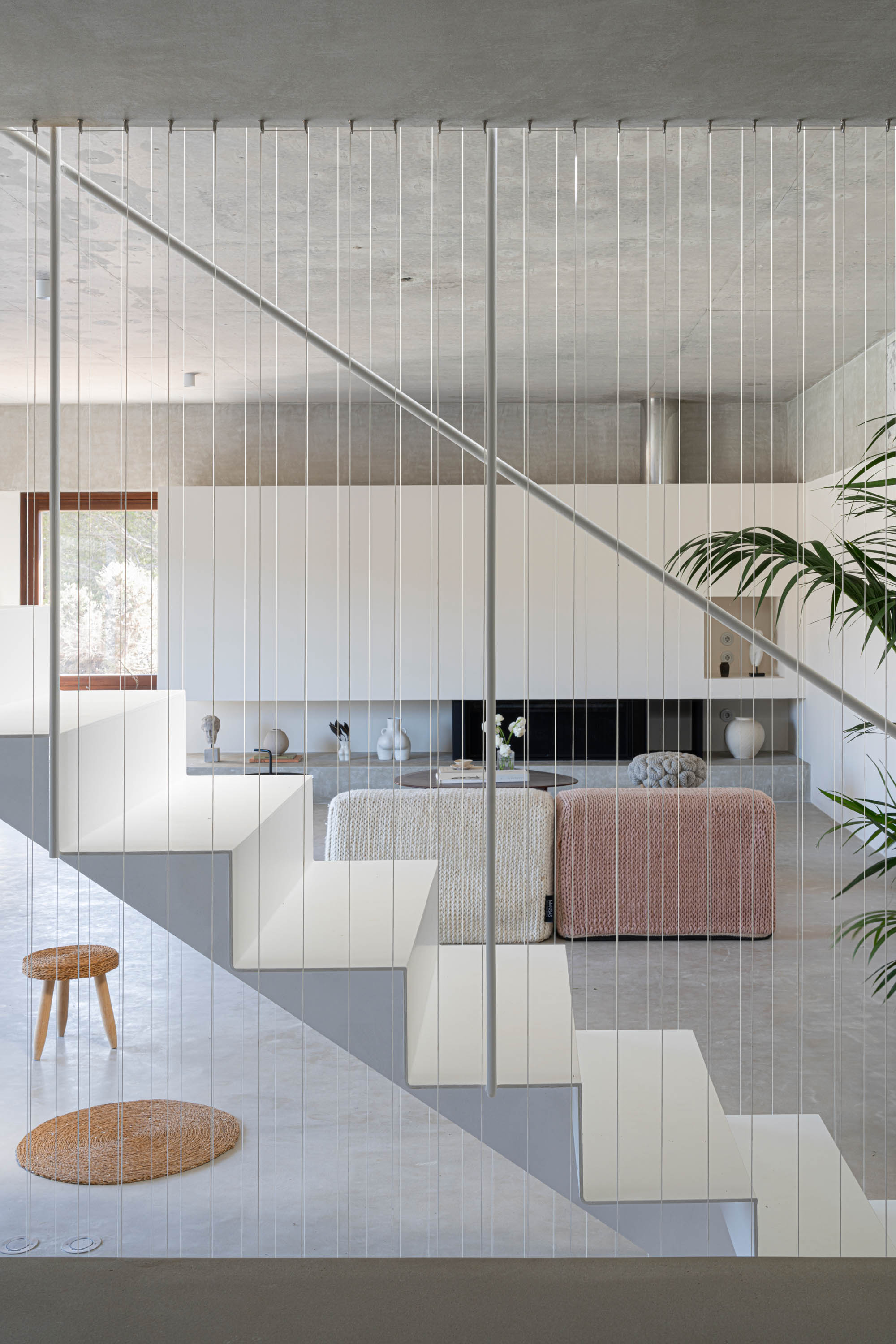 Formentera House by Mari&amp;agrave; Castell&amp;oacute;, a white concrete structure in the countryside