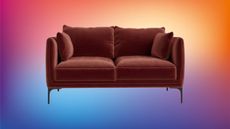 a red velvet sofa on a colorful background