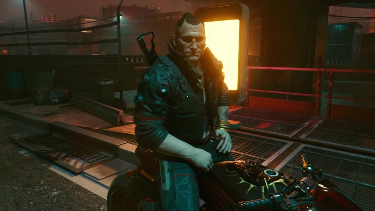 Jackie in Cyberpunk 2077 sat on his motorbike before The Pickup mission starts.