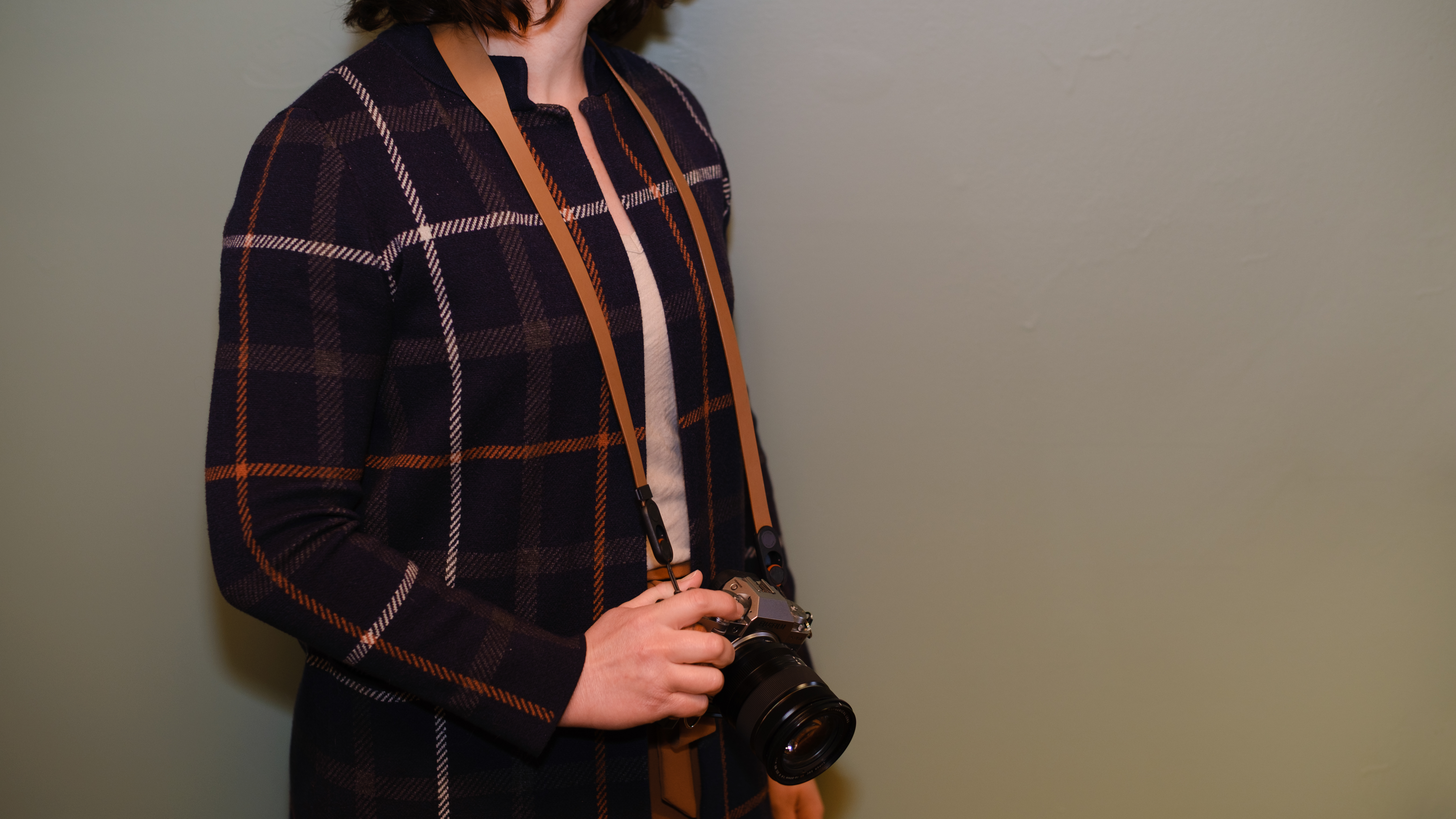 The Peak Design Form leather camera strap in the Amber color