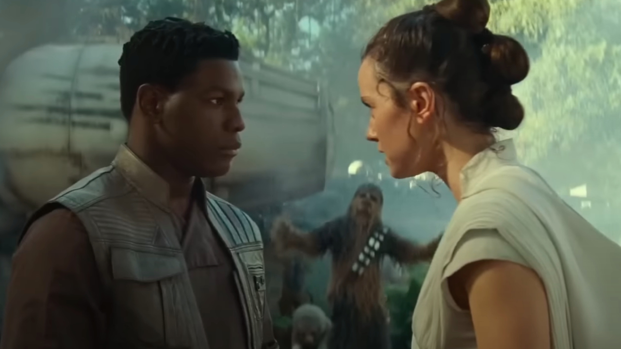 John Boyega and Daisy Ridley with Chewbacca in the background in Star Wars: The Rise of Skywalker