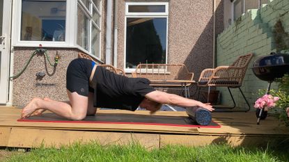 Fit&Well fitness writer Harry Bullmore performing the prayer stretch