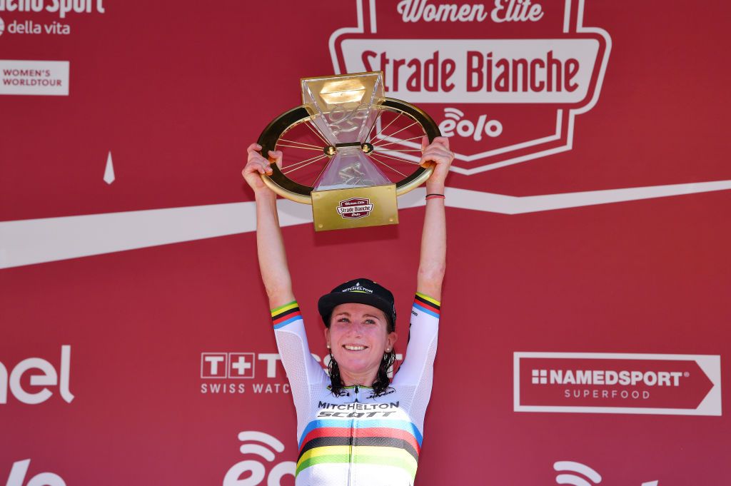 SIENA ITALY AUGUST 01 Podium Annemiek Van Vleuten of The Netherlands and Team Mitchelton Scott World Champion Jersey Celebration Trophy during the Eroica 6th Strade Bianche 2020 Women Elite a 136km race from Siena to Siena Piazza del Campo StradeBianche on August 01 2020 in Siena Italy Photo by Luc ClaessenGetty Images