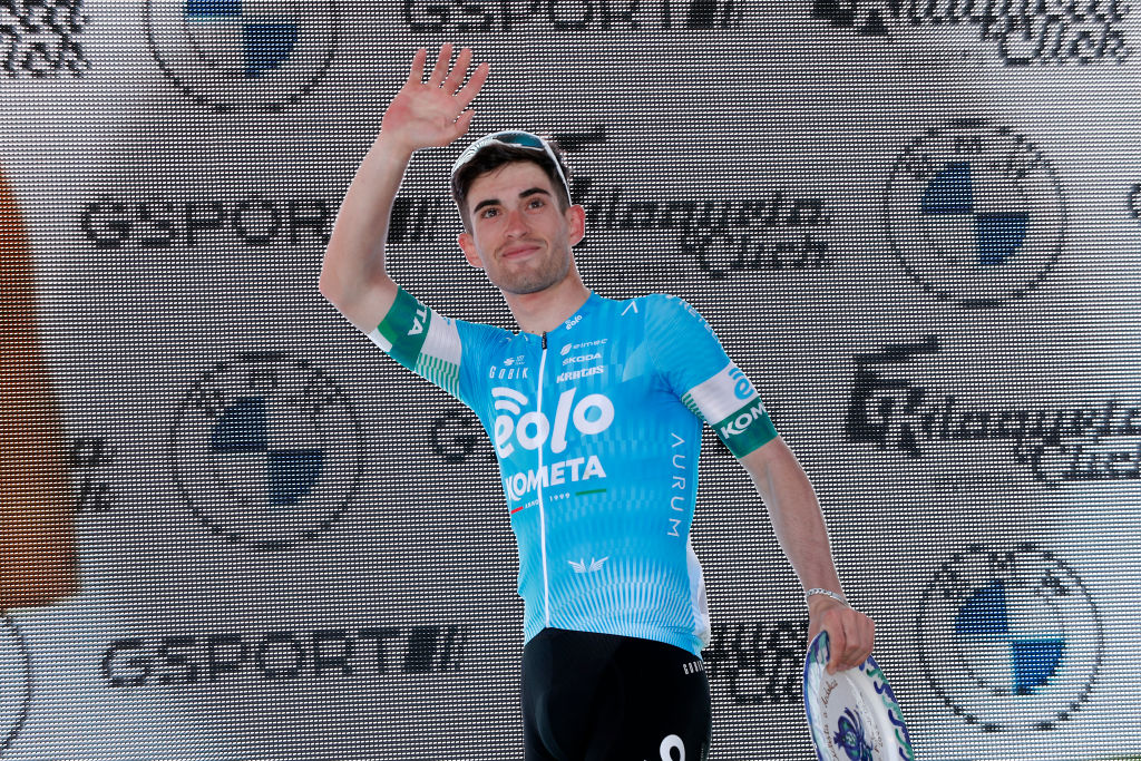OTURA SPAIN FEBRUARY 18 Alejandro Ropero of Spain and EoloKometa Cycling Team celebrates winning a trophy on the podium ceremony after the 68th Vuelta A Andalucia Ruta Del Sol 2022 Stage 3 a 1532km stage from Lucena to Otura 68RdS on February 18 2022 in Otura Spain Photo by Bas CzerwinskiGetty Images