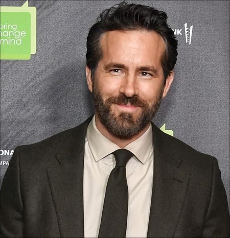 Ryan Reynolds smirking