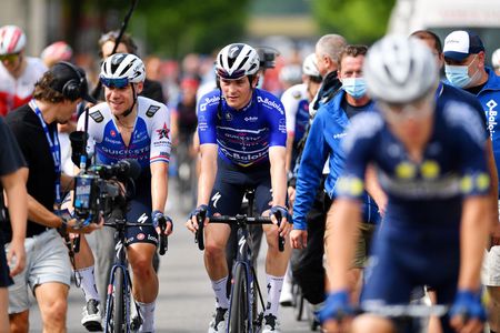 BERINGEN BELGIUM JUNE 19 LR Fabio Jakobsen of Netherlands and Mauro Schmid of Switzerland and Team QuickStep Alpha Vinyl blue leader jersey celebrate winning during the 91st Baloise Belgium Tour 2022 Stage 5 a 1799km stage from Gingelom to Beringen BaloiseBelgiumTour on June 19 2022 in Beringen Belgium Photo by Luc ClaessenGetty Images