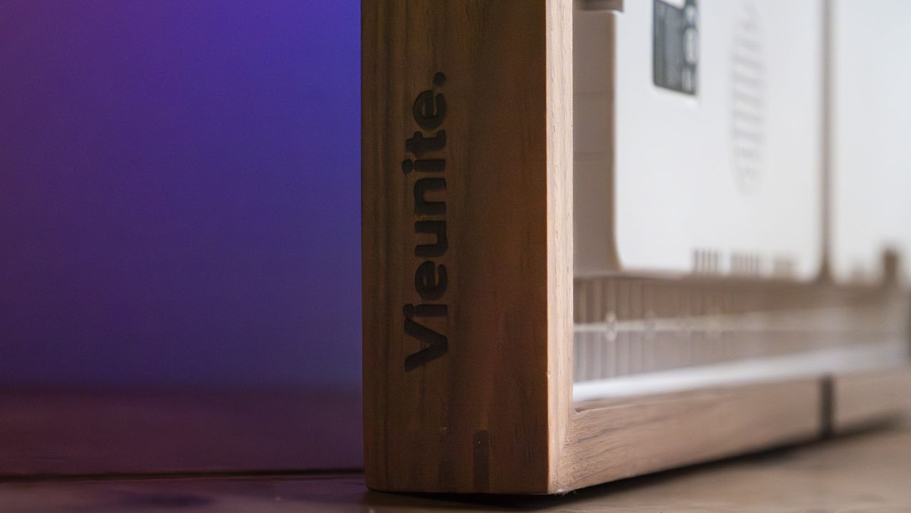 Closeup of the outside frame corner of the Vieunite Textura digital canvas