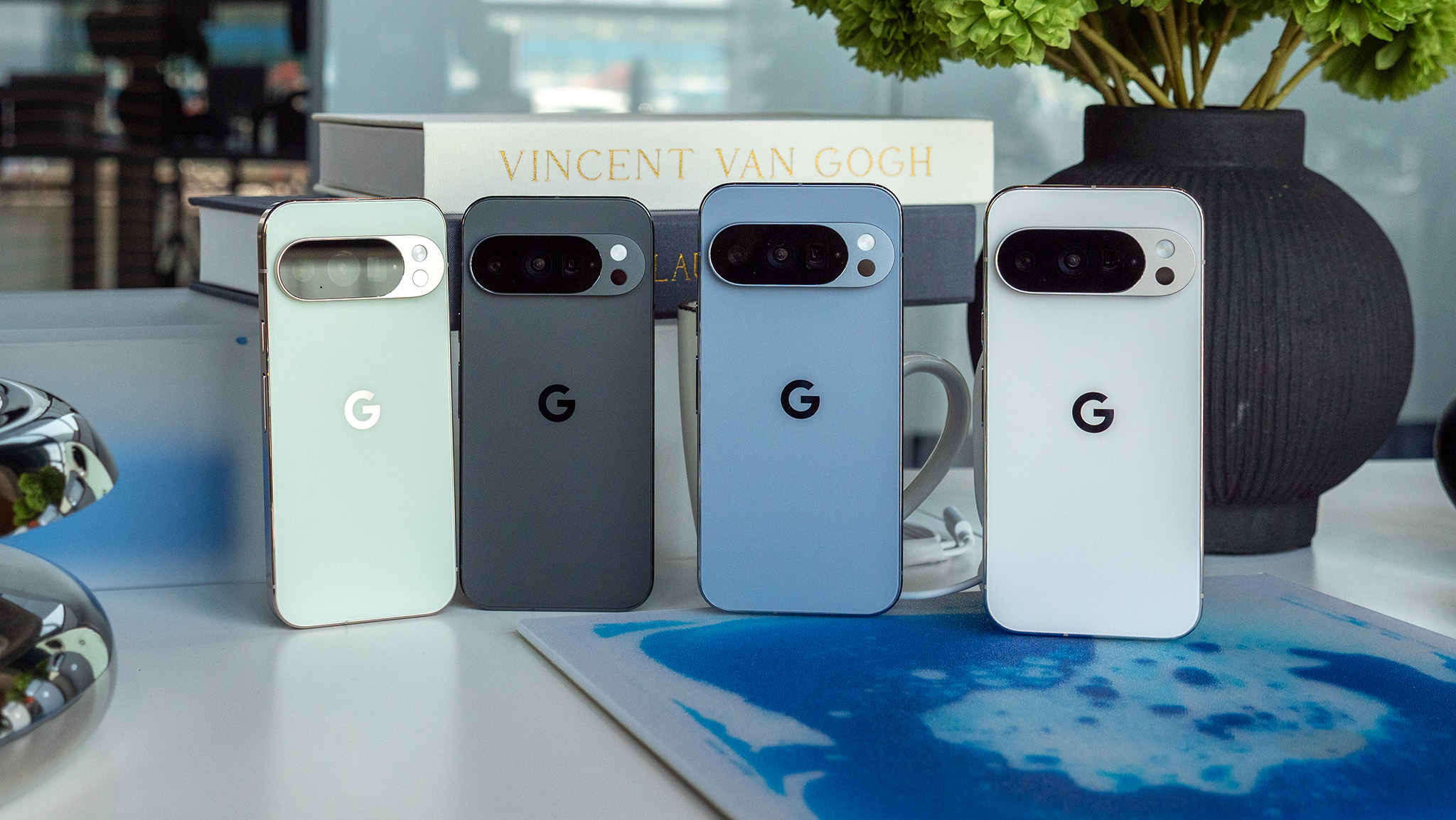 The backs of the Jade and Obsidian Pixel 10 Pro's alongside the Moonstone and Porcelain Pixel 10 Pro XL models