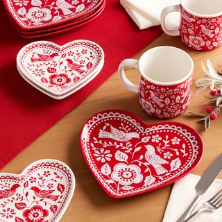 An image showing the World Market Red And White Critter Dishware Collection