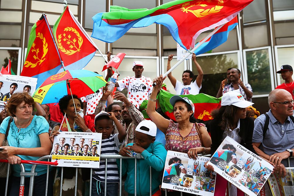 Fans of Daniel Teklehaimanot of Eritrea and MTN-Qhubeka line the street prior to stage 8 of the 2015 Tour de France